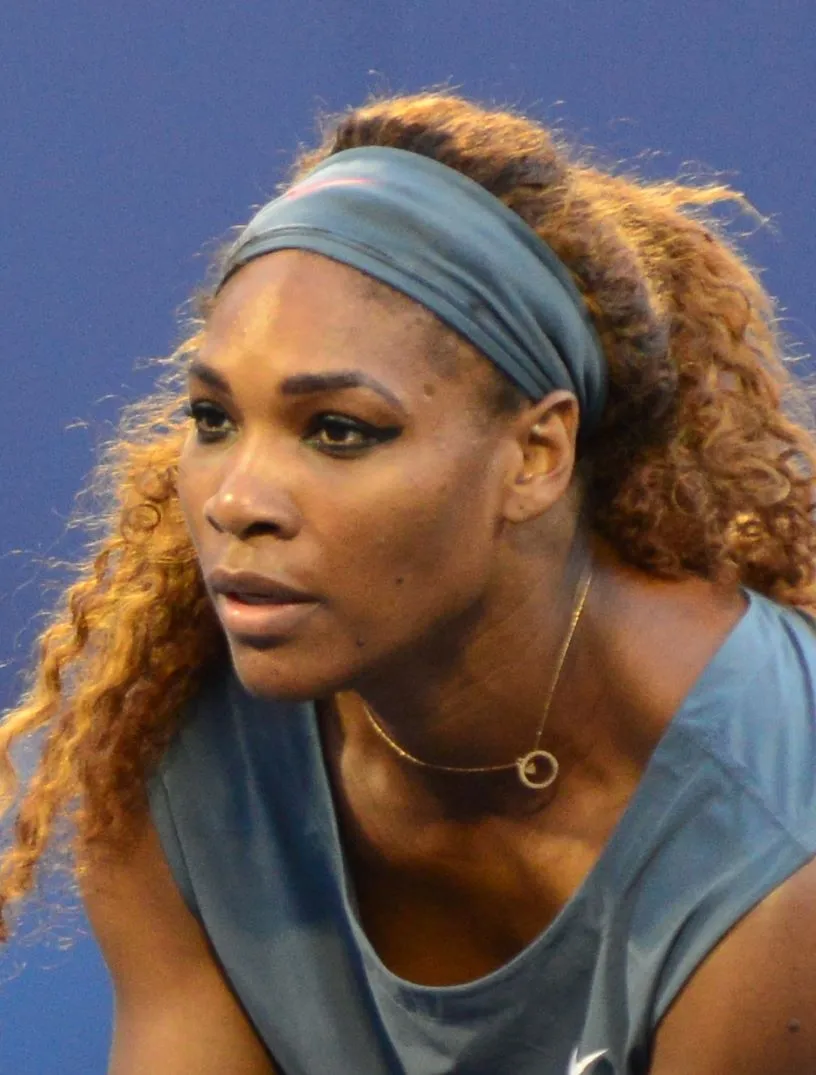 Serena Williams prepares to return serve in a doubles match with sister Venus, back in 2013. Credit: Edwin Martinez