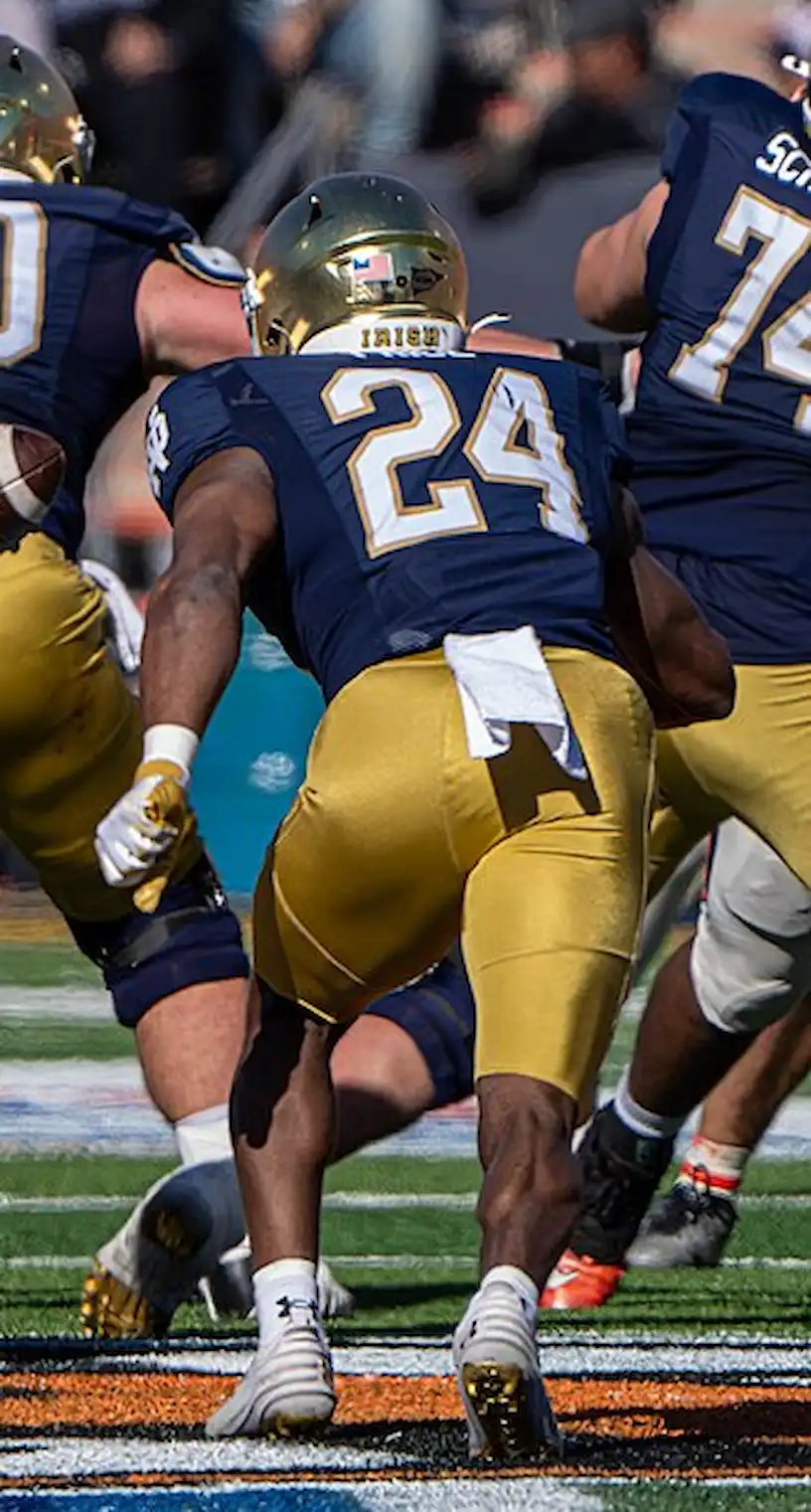 Jadarian Price runs the ball for Notre Dame; he’s expected to enjoy a breakout year for reigning Super Bowl champions, the Seattle Seahawks. Credit: Wikimedia Commons