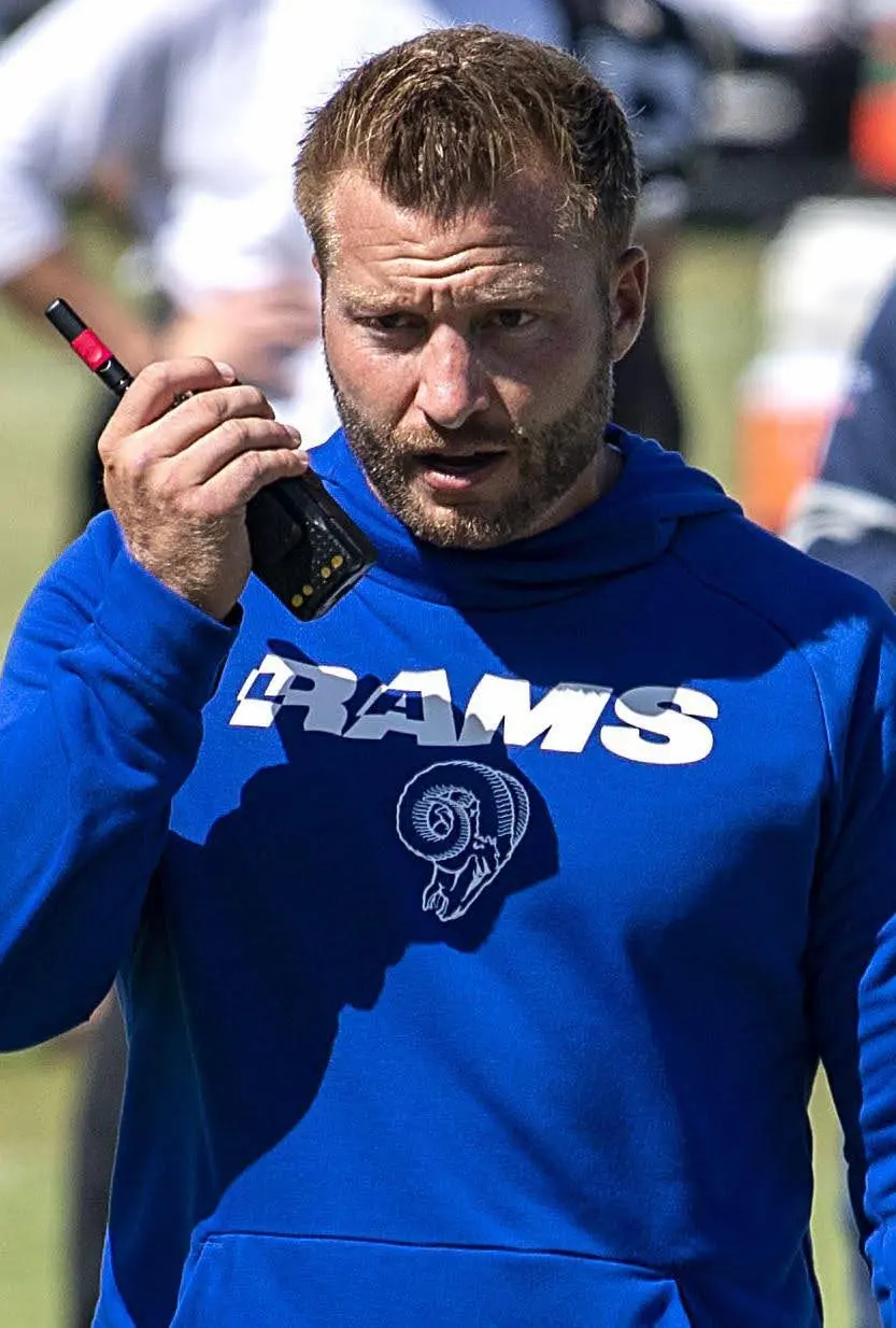 Sean McVay communicates with LA Rams staff during an NFL game in 2019. Credit: Wikimedia Commons